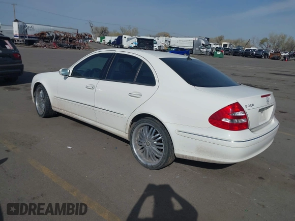 2003 Mercedes-Benz E-Class 3.2L with VIN WDBUF65J63A233107, listed as a IAAI auction lot 42004763 with 151,327 mi miles. Bid and sale history available at carsss.com. Image 3.