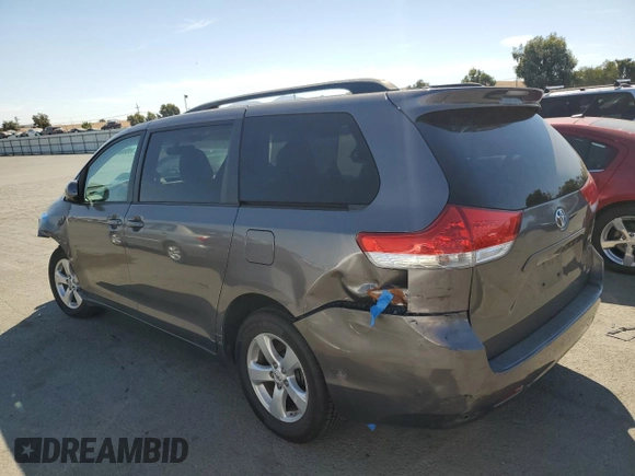 2011 Toyota Sienna LE AAS с VIN 5TDKK3DC3BS133408, выставлен на аукционе Copart как лот 72582564 с пробегом 128 168 миль миль и Списание • Salvage title. История ставок и продаж доступна на DreamBid. Изображение 2.