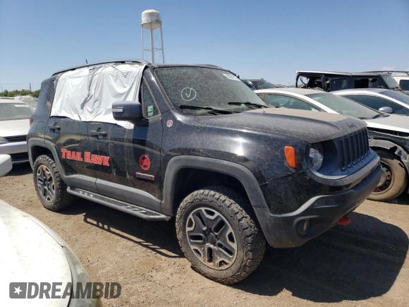 2015 Jeep Renegade Trailhawk z VIN ZACCJBCT9FPB21561, wystawiony jako Copart lot #63051673 z przebiegiem Nie podano mil oraz Szkoda całkowita • Salvage title. Historia ofert i sprzedaży dostępna na DreamBid. Obrazek 4.