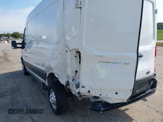 2023 Ford Transit z VIN 1FTBW9CG7PKB84159, wystawiony jako IAAI lot #42772115 z przebiegiem 6 945 mil mil oraz . Historia ofert i sprzedaży dostępna na DreamBid. Obrazek 6.