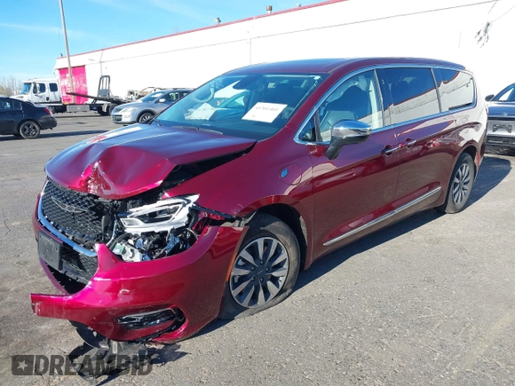 2023 Chrysler Pacifica Hybrid Limited with VIN 2C4RC1S7XPR518695, listed as a IAAI auction lot 41301401 with 24,433 mi miles and . Bid and sale history available at DreamBid. Image 18.