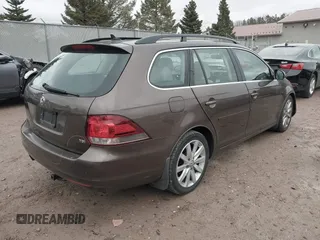 2012 Volkswagen Jetta SportWagen TDI w/Sunroof with VIN 3VWPL7AJ6CM647247, listed as a IAAI auction lot 42042449 with 186,015 mi miles. Bid and sale history available at carsss.com. Image 4.