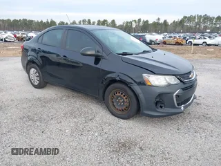 2018 Chevrolet Sonic LS with VIN 1G1JB5SH4J4137170, listed as a IAAI auction lot 41385712 with 146,335 mi miles and . Bid and sale history available at DreamBid. Image 1.