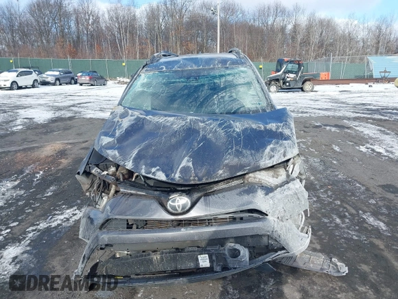 2017 Toyota RAV4 LE with VIN JTMZFREV9HJ119332, listed as a IAAI auction lot 41257790 with 94,992 mi miles and . Bid and sale history available at carsss.com. Image 6.