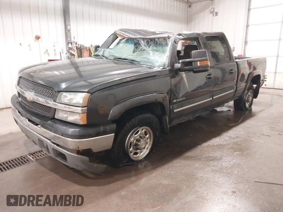 2003 Chevrolet Silverado 1500HD LS z VIN 1GCGK13U93F171585, wystawiony jako IAAI lot #41990852 z przebiegiem 242 327 mil mil oraz . Historia ofert i sprzedaży dostępna na DreamBid. Obrazek 2.