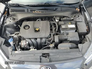 2021 Kia Forte LXS z VIN 3KPF24AD1ME303427, wystawiony jako Copart lot #57817315 z przebiegiem 65 648 mil mil oraz Nie do naprawy • Non repairable. Historia ofert i sprzedaży dostępna na DreamBid. Obrazek 11.