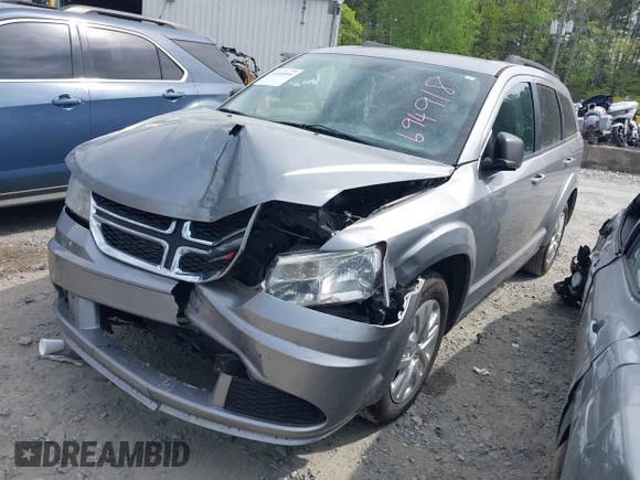 2017 Dodge Journey SE z VIN 3C4PDCAB0HT694918, wystawiony jako IAAI lot #42010594 z przebiegiem 135 432 mil mil oraz . Historia ofert i sprzedaży dostępna na DreamBid. Obrazek 2.