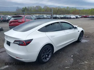 2019 Tesla Model 3 Mid Range with VIN 5YJ3E1EA5KF397098, listed as a IAAI auction lot 41943570 with 72,046 mi miles and . Bid and sale history available at DreamBid. Image 4.