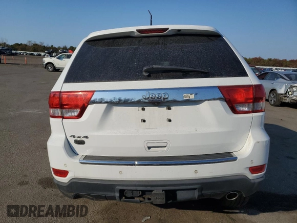 2013 Jeep Grand Cherokee Overland with VIN 1C4RJFCG8DC639408, listed as a Copart auction lot 77910444 with 89,623 mi miles and Salvage Title. Bid and sale history available at carsss.com. Image 6.
