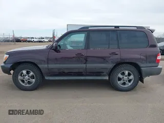 2006 Toyota Land Cruiser z VIN JTEHT05J962081200, wystawiony jako IAAI lot #41532495 z przebiegiem 217 230 mil mil oraz . Historia ofert i sprzedaży dostępna na DreamBid. Obrazek 14.