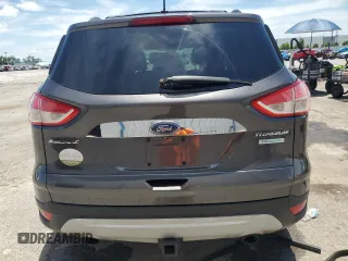 2015 Ford Escape Titanium z VIN 1FMCU0J98FUB06577, wystawiony jako Copart lot #61341175 z przebiegiem 66 206 mil mil oraz Szkoda całkowita • Salvage title. Historia ofert i sprzedaży dostępna na DreamBid. Obrazek 6.