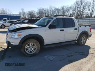 2010 Ford Explorer Sport Trac XLT z VIN 1FMEU3BE5AUA38530, wystawiony jako Copart lot #46987525 z przebiegiem 132 432 mil mil oraz Szkody całkowita. Historia ofert i sprzedaży dostępna na DreamBid. Obrazek 1.