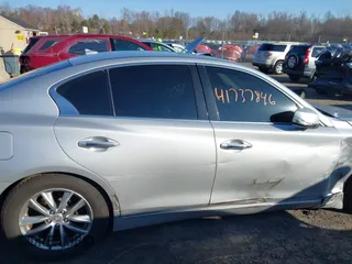 2014 Infiniti Q50 Premium with VIN JN1BV7AR9EM686042, listed as a IAAI auction lot 41737846 with 107,729 mi miles. Bid and sale history available at carsss.com. Image 13.