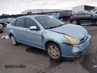 2008 Ford Focus SE with VIN 1FAHP35N78W270569, listed as a IAAI auction lot 38518647 with 173,674 mi miles. Bid and sale history available at carsss.com. Image 1.