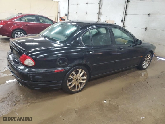 2005 Jaguar X-Type 3.0L with VIN SAJWA51C05WE41522, listed as a Copart auction lot 62837564 with 91,885 mi miles and Clean Title. Bid and sale history available at carsss.com. Image 3.