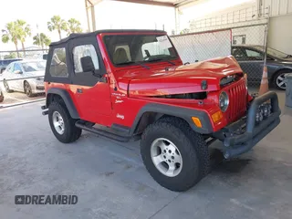 2001 Jeep Wrangler Sport z VIN 1J4FA49S41P367392, wystawiony jako IAAI lot #42264560 z przebiegiem 273 181 mil mil oraz . Historia ofert i sprzedaży dostępna na DreamBid. Obrazek 1.