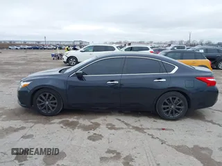 2017 Nissan Altima SV with VIN 1N4AL3AP0HC140462, listed as a IAAI auction lot 41534533 with 110,425 mi miles and . Bid and sale history available at DreamBid. Image 14.