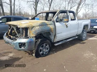 2016 GMC Sierra 2500HD SLE z VIN 1GT22SEG5GZ232894, wystawiony jako IAAI lot #41593141 z przebiegiem 159 000 mil mil oraz . Historia ofert i sprzedaży dostępna na DreamBid. Obrazek 2.