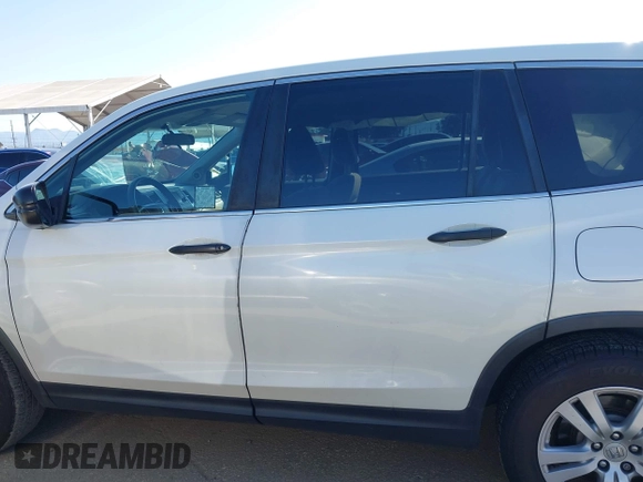 2016 Honda Pilot LX with VIN 5FNYF5H12GB051880, listed as a IAAI auction lot 41965816 with 112,705 mi miles and . Bid and sale history available at DreamBid. Image 14.