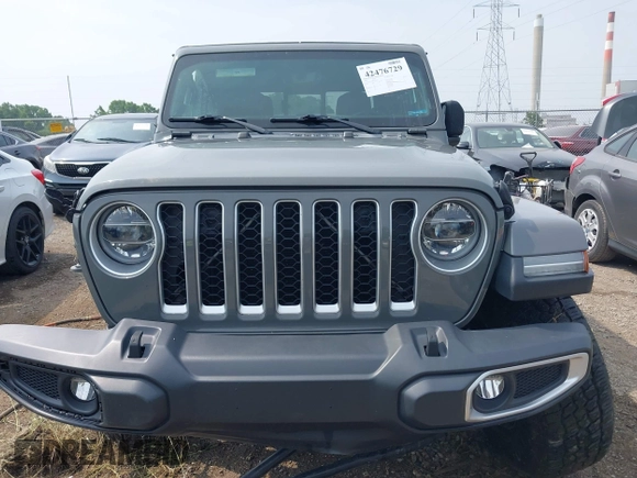 2020 Jeep Gladiator Overland with VIN 1C6HJTFG0LL169628, listed as a IAAI auction lot 42476729 with 102,874 mi miles and . Bid and sale history available at DreamBid. Image 13.