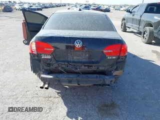 2012 Volkswagen Jetta Sedan SE w/Convenience with VIN 3VWDX7AJ3CM394041, listed as a IAAI auction lot 41905471 with 153,837 mi miles. Bid and sale history available at carsss.com. Image 5.