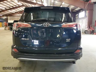 2018 Toyota RAV4 XLE with VIN 2T3RFREV5JW719787, listed as a Copart auction lot 54499305 with 198,226 mi miles and Clean Title. Bid and sale history available at carsss.com. Image 6.