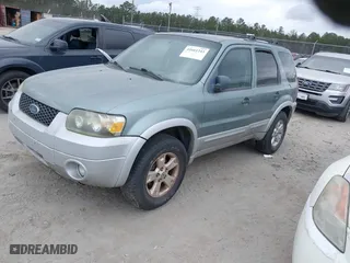 2007 Ford Escape XLT with VIN 1FMYU03157KA67702, listed as a IAAI auction lot 41661243 with 1 mi miles. Bid and sale history available at carsss.com. Image 2.