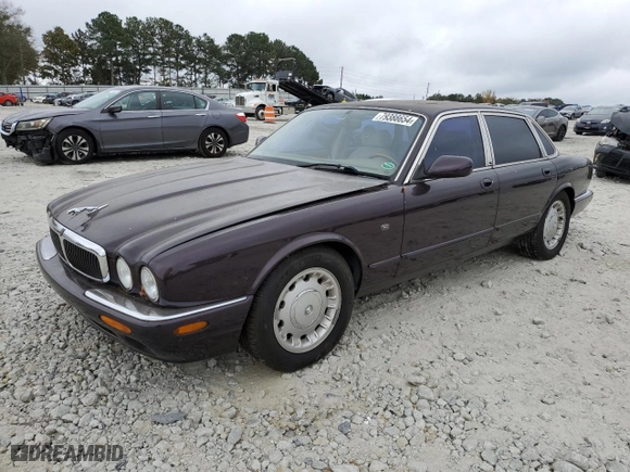 1998 Jaguar XJ with VIN SAJHX1240WC822861, listed as a Copart auction lot 79388654 with 120,568 mi miles and Non Repairable. Bid and sale history available at carsss.com. Image 1.