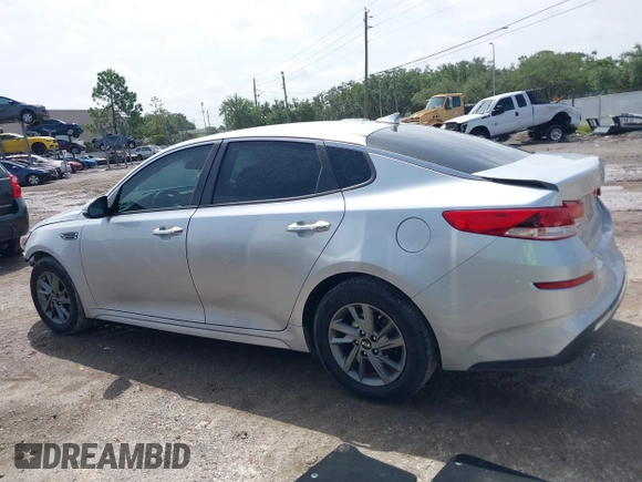 2019 Kia Optima LX z VIN 5XXGT4L37KG281329, wystawiony jako IAAI lot #42434855 z przebiegiem 113 448 mil mil oraz . Historia ofert i sprzedaży dostępna na DreamBid. Obrazek 14.
