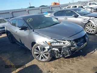 2020 Nissan Maxima SL z VIN 1N4AA6DV4LC379958, wystawiony jako IAAI lot #42054580 z przebiegiem 100 414 mil mil oraz . Historia ofert i sprzedaży dostępna na DreamBid. Obrazek 1.