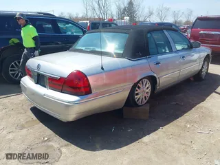 2005 Mercury Grand Marquis LS Premium with VIN 2MEFM75WX5X663507, listed as a IAAI auction lot 42046613 with 85,358 mi miles. Bid and sale history available at carsss.com. Image 4.