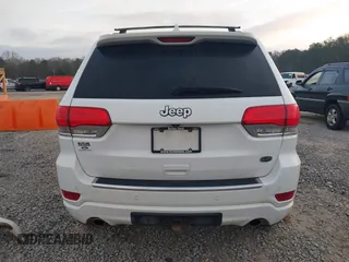 2015 Jeep Grand Cherokee High Altitude with VIN 1C4RJECG8FC175565, listed as a IAAI auction lot 41733248 with 107,947 mi miles. Bid and sale history available at carsss.com. Image 17.
