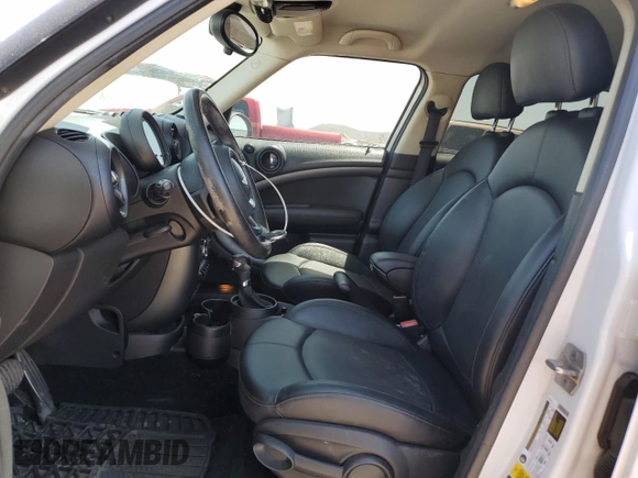 2016 MINI Countryman S with VIN WMWZC3C58GWT09694, listed as a Copart auction lot 57113235 with 126,082 mi miles and Salvage title. Bid and sale history available at DreamBid. Image 7.