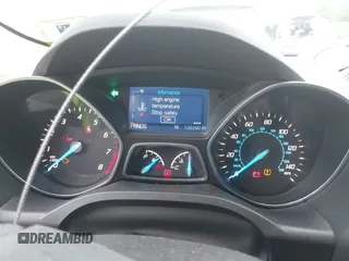 2015 Ford Escape SE z VIN 1FMCU0G73FUB10414, wystawiony jako IAAI lot #42173063 z przebiegiem 120 200 mil mil oraz . Historia ofert i sprzedaży dostępna na DreamBid. Obrazek 7.