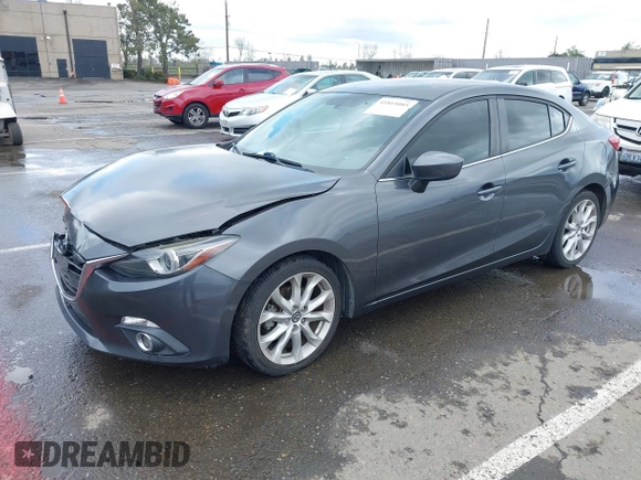 2014 Mazda 3 S Touring with VIN JM1BM1V31E1132448, listed as a IAAI auction lot 41815085 with 144,705 mi miles and . Bid and sale history available at DreamBid. Image 17.