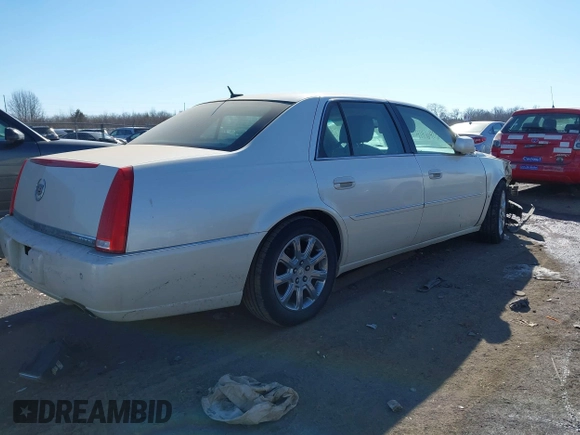 2008 Cadillac DTS 1SD z VIN 1G6KD57YX8U146211, wystawiony jako IAAI lot #41416406 z przebiegiem 141 362 mil mil oraz . Historia ofert i sprzedaży dostępna na DreamBid. Obrazek 4.
