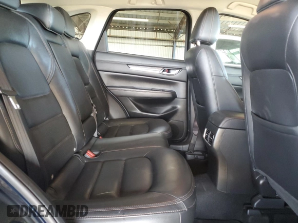 2019 Mazda CX-5 Grand Touring with VIN JM3KFADM3K1539890, listed as a Copart auction lot 57809835 with 56,079 mi miles and Salvage title. Bid and sale history available at DreamBid. Image 11.