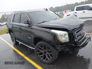 2016 GMC Yukon SLT with VIN 1GKS1BKC8GR217962, listed as a IAAI auction lot 40422726 with 182,293 mi miles. Bid and sale history available at carsss.com. Image 1.