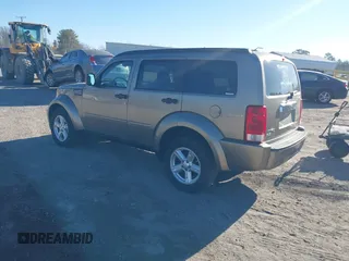 2007 Dodge Nitro SLT with VIN 1D8GU58K17W644847, listed as a IAAI auction lot 41462223 with 220,325 mi miles and . Bid and sale history available at carsss.com. Image 3.