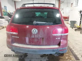 2004 Volkswagen Touareg z VIN WVGCM67LX4D038012, wystawiony jako IAAI lot #41285460 z przebiegiem Nie podano mil oraz . Historia ofert i sprzedaży dostępna na DreamBid. Obrazek 16.