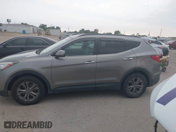 2016 Hyundai Santa Fe z VIN 5XYZU3LB3GG370826, wystawiony jako IAAI lot #42325158 z przebiegiem 146 916 mil mil oraz . Historia ofert i sprzedaży dostępna na DreamBid. Obrazek 14.