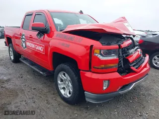 2018 Chevrolet Silverado 1500 LT with VIN 1GCVKREC1JZ370801, listed as a IAAI auction lot 41794974 with 74,510 mi miles. Bid and sale history available at carsss.com. Image 1.