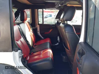 2016 Jeep Wrangler Unlimited Sport z VIN 1C4BJWDG5GL257423, wystawiony jako IAAI lot #42530026 z przebiegiem 157 072 mil mil oraz . Historia ofert i sprzedaży dostępna na DreamBid. Obrazek 8.