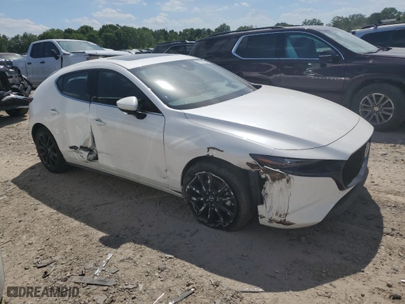 2023 Mazda Mazda3 Hatchback 2.5 S Premium with VIN JM1BPBMM6P1611880, listed as a Copart auction lot 57832604 with 16,093 mi miles and Salvage Title. Bid and sale history available at carsss.com. Image 4.