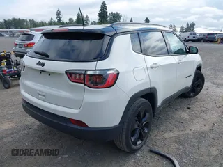 2019 Jeep Compass Latitude with VIN 3C4NJCBB0KT677025, listed as a IAAI auction lot 42574952 with 53,681 mi miles and . Bid and sale history available at DreamBid. Image 4.