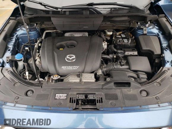 2018 Mazda CX-5 Grand Touring with VIN JM3KFADM8J1351624, listed as a Copart auction lot 50965465 with 66,210 mi miles and Salvage Title. Bid and sale history available at DreamBid. Image 12.