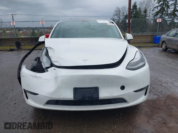 2021 Tesla Model Y Standard Range with VIN 5YJYGDED3MF103499, listed as a IAAI auction lot 41632064 with 132,846 mi miles and . Bid and sale history available at DreamBid. Image 12.