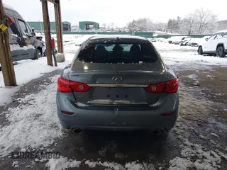 2015 Infiniti Q50 Premium with VIN JN1BV7AR4FM399046, listed as a IAAI auction lot 41560885 with 143,488 mi miles and . Bid and sale history available at DreamBid. Image 16.