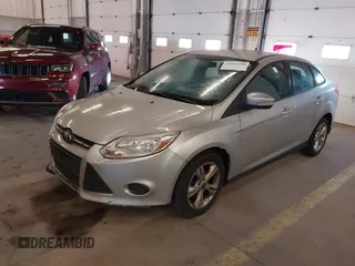 2013 Ford Focus SE z VIN 1FADP3F24DL277767, wystawiony jako IAAI lot #41562390 z przebiegiem 183 322 mil mil oraz . Historia ofert i sprzedaży dostępna na DreamBid. Obrazek 2.