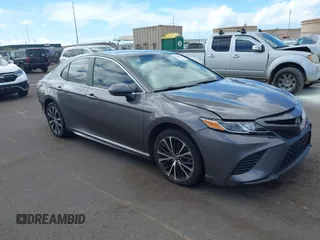 2019 Toyota Camry LE z VIN 4T1B11HK5KU165065, wystawiony jako IAAI lot #42182383 z przebiegiem Nie podano mil oraz . Historia ofert i sprzedaży dostępna na DreamBid. Obrazek 1.